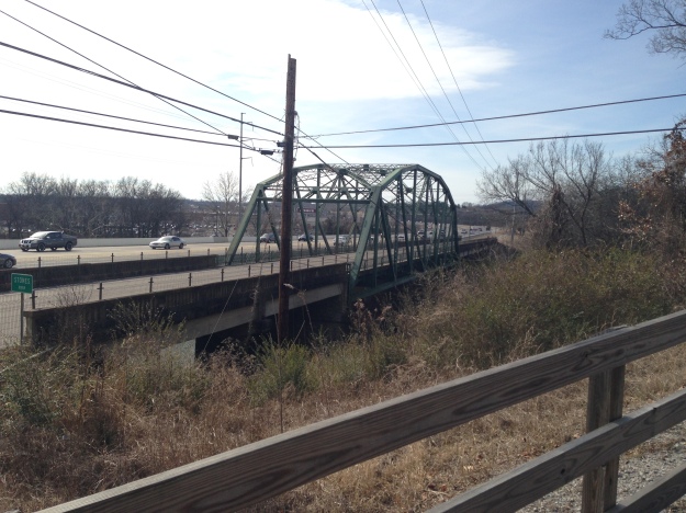 View of the steel truss bridge from the greenway